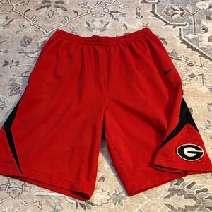 Nike Men's Red Athletic Shorts with Black Accents size medium